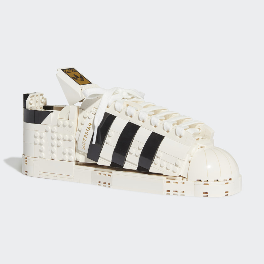 Today the Adidas Superstar Lego Set Drop. Two shoes: one to wear