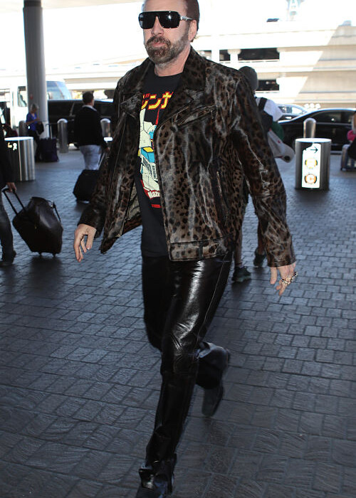 Nicolas Cage is seen arriving at LAX in Los Angeles, CA. Cage was spotted wearing a daring leopard-print jacket and a graphic T-Shirt.Pictured: Nicolas CageRef: SPL5025571 180918 NON-EXCLUSIVEPicture by: SplashNews.comSplash News and PicturesLos Angeles: 310-821-2666New York: 212-619-2666London: 0207 644 7656Milan: 02 4399 8577photodesk@splashnews.comWorld Rights, No France Rights